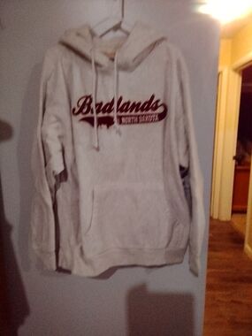 Cream Pullover Hoodie with Maroon 'Badlands' Logo